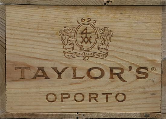 A case of six bottles of Taylors Vintage Port, 1997, in unopened wooden case from The Wine Society.